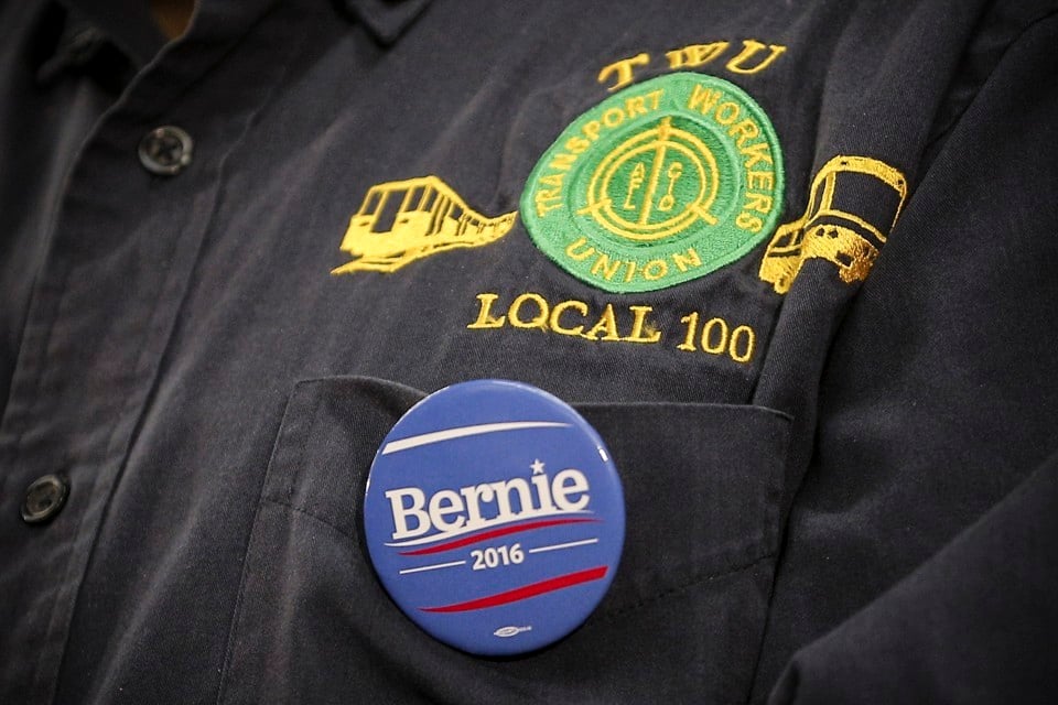 Photo of a union jacket with a Bernie Sanders campaign pin on it