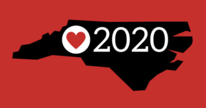 Red background with black silhouette of the outline of the state of North Carolina with a red heart in the middle and 2020 overlaid
