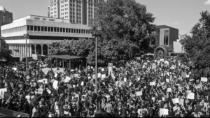 Black and white photo of protesters at a march