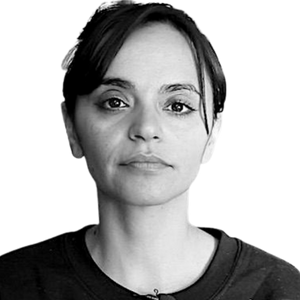 Black and white headshot of Lara Kiswani