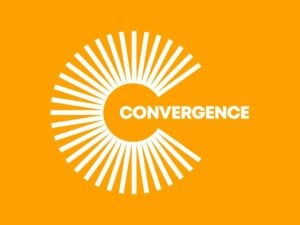white Convergence logo in front of orange background