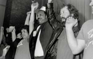Rev. Jesse Jackson with striking International Paper workers in Maine, 1987